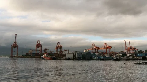 Time lapse of stormy clouds over Port of Vancouver BC from daylight into evening Stock Footage 91798743