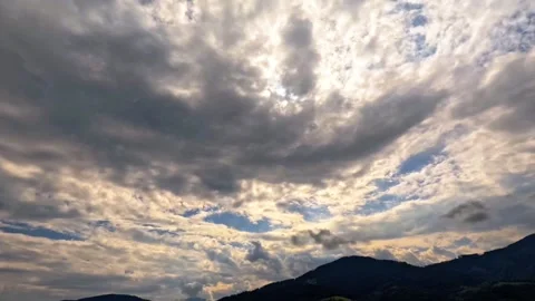 Time lapse of stormy clouds sun and mountains Stock Footage 315363172
