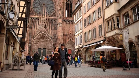 Time Lapse of Strasbourg with People Visit Notre Dame Cathedrale Iconic Landmark Stock Footage 104969142