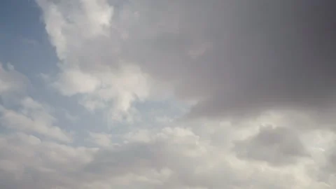 Time lapse, stratus clouds carrying the wind obscuring the blue sky before the Stock Footage 276234533