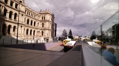 Time lapse stream of buses pass Brisbane Casino 4K Video stock 157346410