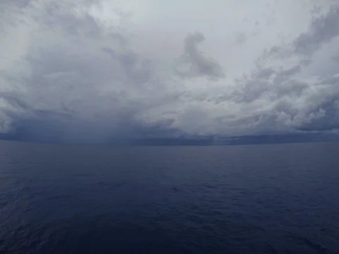 Time lapse strom cloud or raining moving left over ocean Stock Footage 113866136