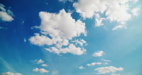 Time-lapse of Summer Clouds Against Blue Sky Stock Footage 310802714