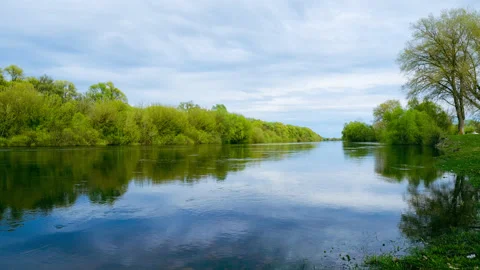 Time lapse of a summer landscape with a cloudy skies.  Beautiful spring green Stock Footage 201353562