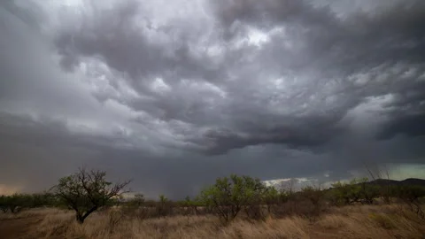 Time lapse of a summer monsoon storm in the desert with lightning Stock Footage 246689793
