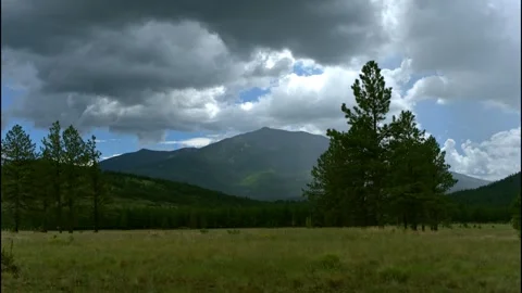 Time lapse of summer rains over a mountain range Stock Footage 345339317