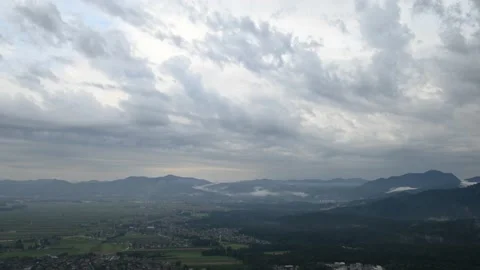 Time lapse of summer storm clouds moving over Ljubljana basin in Slovenia Stock Footage 136480678