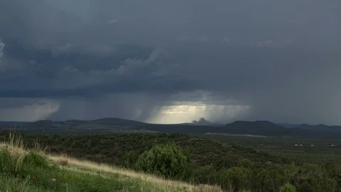 Time lapse of a summer thunderstorm across a desert valley Stock Footage 92679788