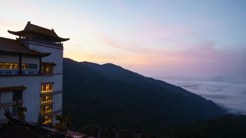 Time lapse at summit of Genting Highlands, view of mountain and Buddha temple Stock Footage 105984278