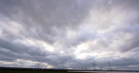 Time lapse of sun and clouds from day to sunset Stock Footage 73873580