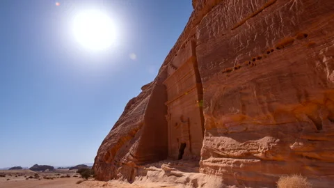 Time lapse of sun and shadow casting the tomb in , Al-`Ula, Hegra, Saudi Arabia. Stock Footage 296981925