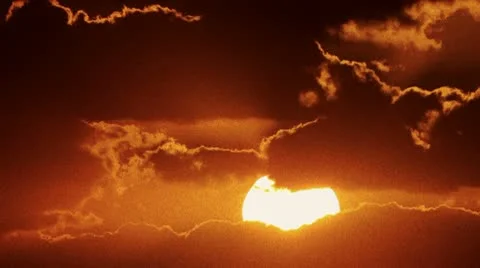 Time Lapse of the Sun Behind Dramatic Clouds Stock Footage 10760286