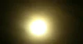 Time lapse sun behind foggy sky HD Footage