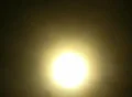 Time lapse sun behind foggy sky Footage