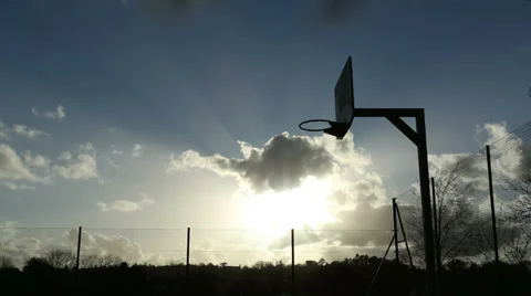 Time lapse of the sun breaking between the rushing clouds Stock Footage 36487832