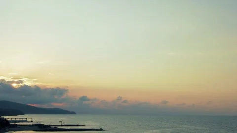 Time Lapse Sun Clouds Blue Orange Sky Over Sea. Beautiful Seascape 4K. Sun Sets  Stock Footage 249273436
