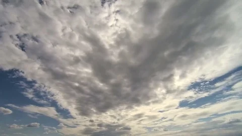 TIME-LAPSE: sun coming out from clouds Stock Footage 75927634