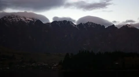 Time lapse of sun flare on the remarkables mountains Stock Footage 11526345
