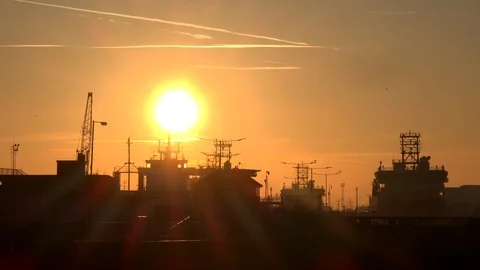 Time lapse of sun going down over ships in Hull UK England 4K Stock Footage 103452159