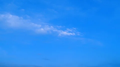 Time lapse of sun going down with bright blue sky turning black at night time Video stock 122439034