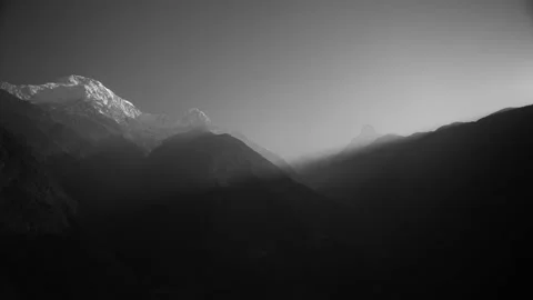 Time Lapse The Sun Light Shining behind mountain In morning against the Mountain Stock Footage 154020116