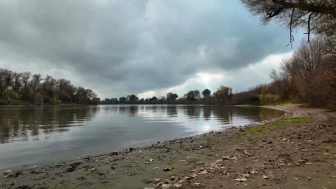 Time Lapse with Sun Rays Break Through Clouds Over the Sacramento River Stock Footage 325744914