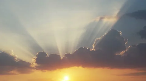 Time lapse of sun rays emerging though the clouds Stock Footage 49253245