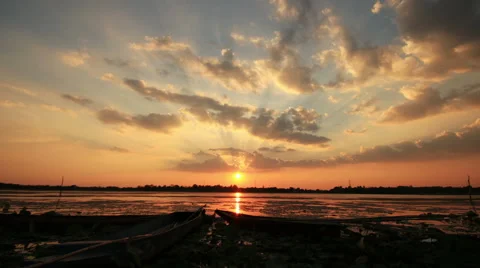 Time lapse  sun rays emerging though  clouds running.Sunrise or sunset. Video stock 52116095