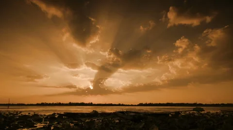 Time lapse sun rays emerging though clouds  billowing. Stock Footage 52116160
