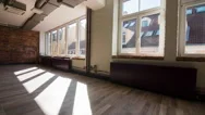 Time-Lapse Of Sun Rays Moving Over An Empty Rustic Office Space Stock Footage