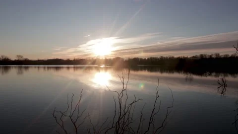 Time lapse Sun rises over the river 4K Stock Footage 167538004