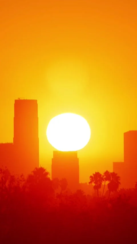 Time Lapse of the sun rising behind Los Angeles 動画素材 219885114