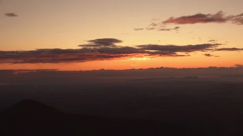 Time lapse of the sun rising during sunrise through the mountains. Girona Stock Footage 123047499