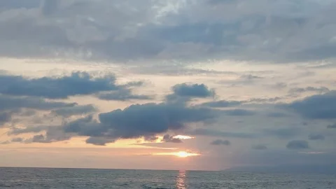 Time lapse sun rising over ocean. Colorful dramatic sky at dusk Stock Footage 258068758