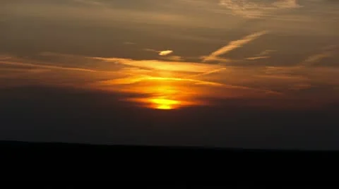  Time Lapse Sun setting behind the clouds Video stock 11058777