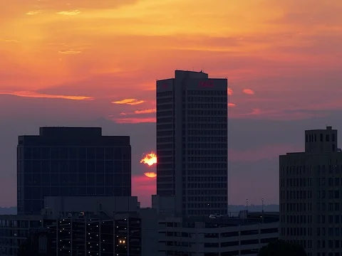 Time Lapse of the Sun Setting behind the Coca Cola Building in Atlanta Georgia Stock Footage 75521153