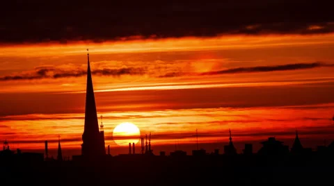 Time lapse of a sun setting down behind church silhouette Stock Footage 49050124