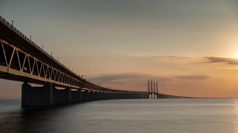 Time lapse of sun setting over the Oresund bridge Stock Footage
