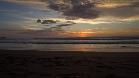Time lapse of sun setting over tropical Playa Grande Costa Rica Stock Footage 91012399