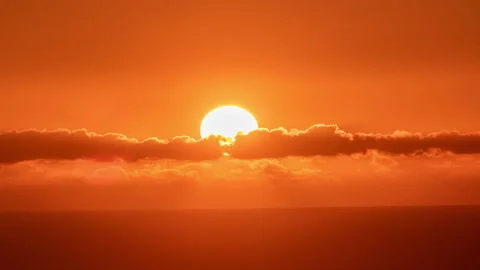 Time lapse - Sun setting over the ocean in Big Island, Hawaii. Stock Footage 234835900