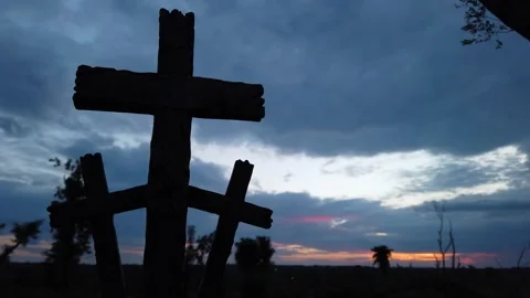 Time Lapse of sun setting with pan over 3 Christian crosses Stock Footage 137651890