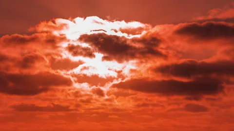 Time Lapse - Sun setting through the clouds Stock Footage 46333892