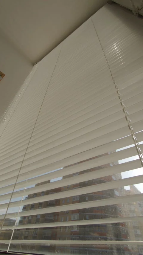 Time lapse sun shining through blinds Stock Footage 265909862