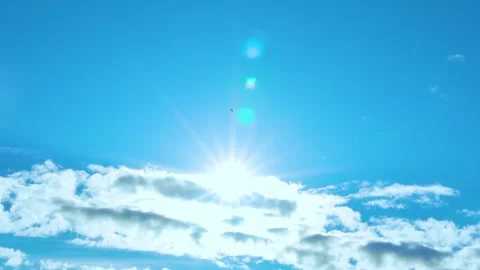 Time Lapse of a Sunny Blue Skyscraper with the Sun and White Clouds at Noon, Day Stock Footage 241415809