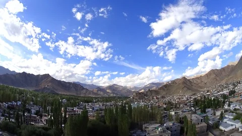 Time lapse sunny day over the city in mountains Stock Footage 95399089