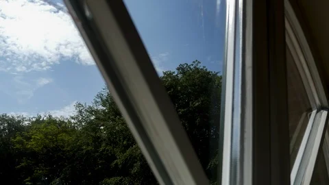 Time-Lapse of Sunny Day Sky Behind Window Stock Footage 121223098