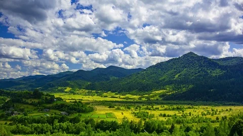 Time lapse of sunny day in small village at the Ukrainian Carpathian mountains Stock Footage 112722933