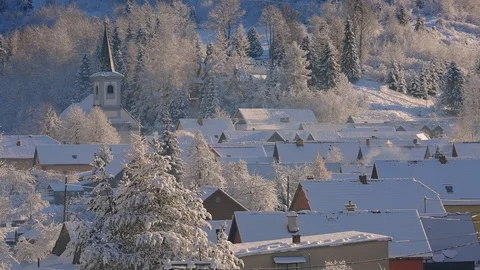 Time-lapse of sunny snowy village among the hills in northern Slovakia Stock Footage