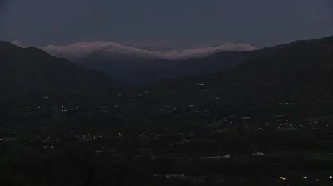 Time lapse of sunrise after a snowstorm above Ojai, California. Stock Footage 1020112