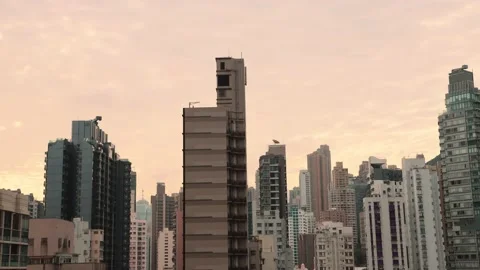 Time lapse of Sunrise and clouds over cities of high-rise and density buildin Stock Footage 153405807